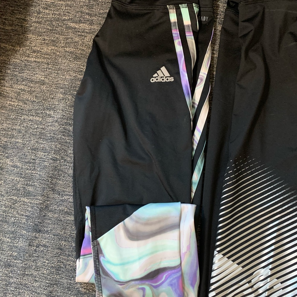 2 pairs of Adidas leggings girls 10/12 and one pair of girls puma leggings pink
